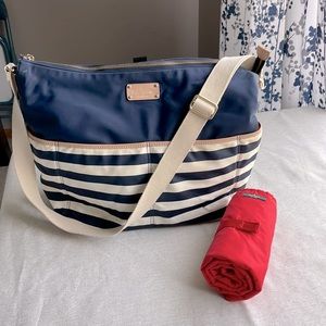 Authentic Kate Spade Diaper bag. Navy blue & cream stripes with red interior.